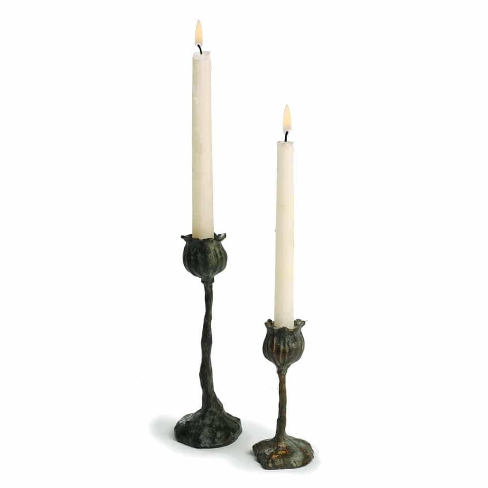 Bronze candlesticks inspired by the graceful form of flower seed pods, in two sizes on a white background.