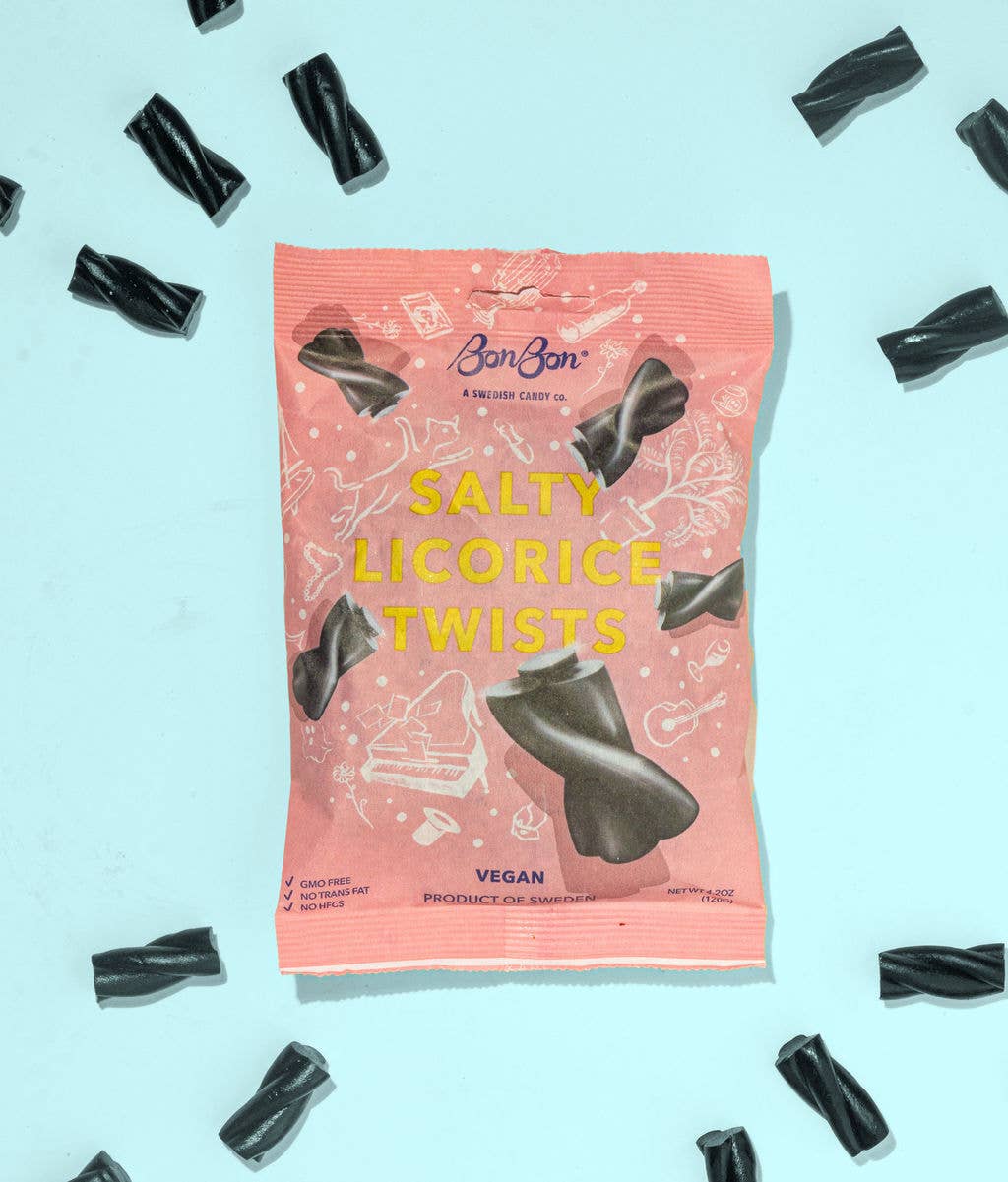 Pink package of Salty Licorice Twists from Bonbon, a swedish candy co. with licorice pieces on a light blue background