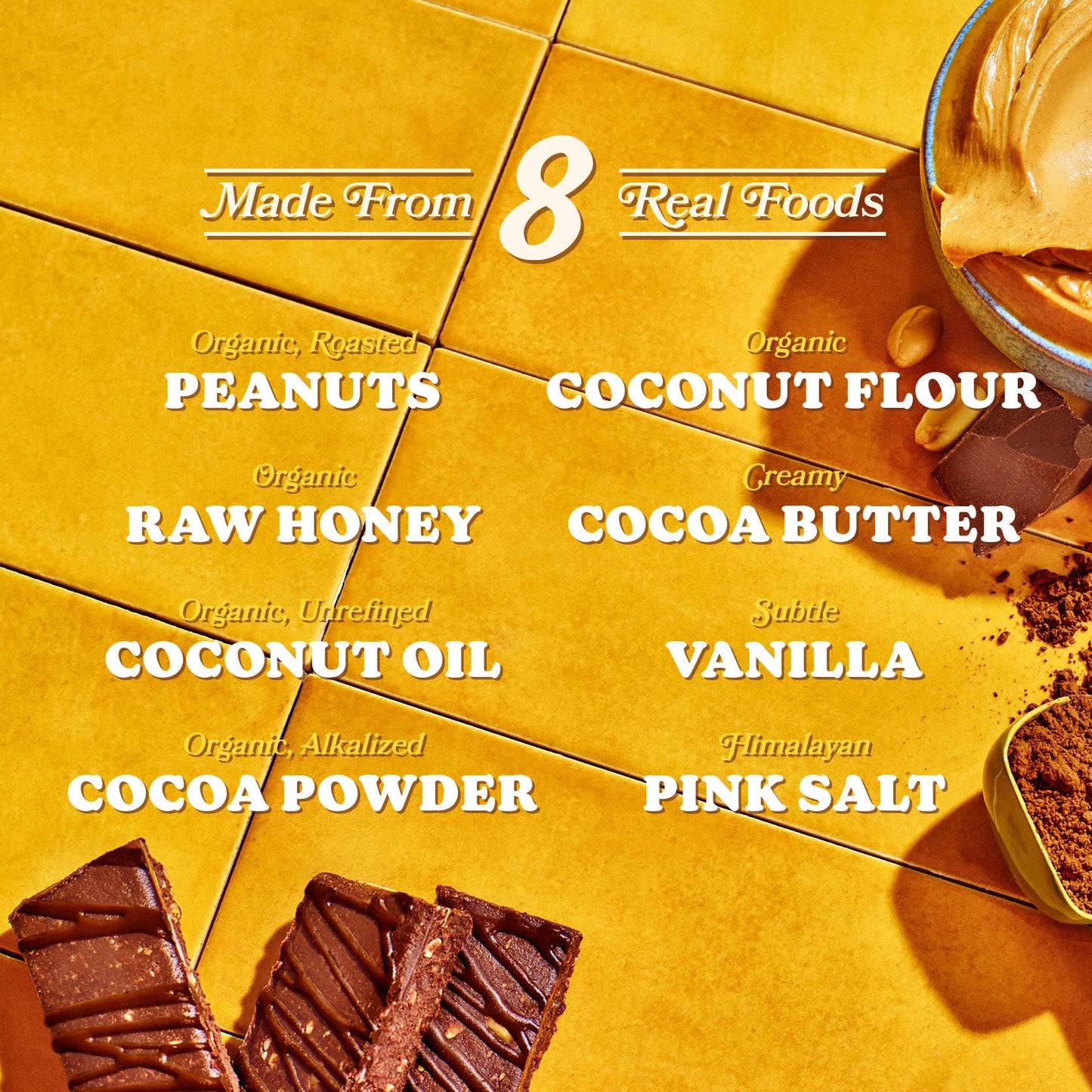 The real foods used to make the Honey Mama’s Peanut Butter Chocolate Bar with roasted peanuts and honey.