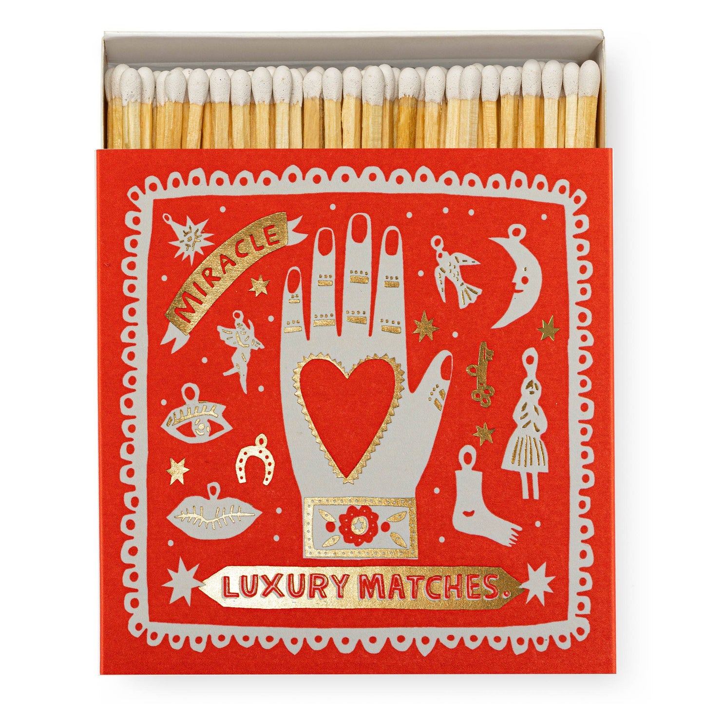The archivist gallery's signature square matchbox featuring the illustration of a hand with a heart in the middle surrounded by an array of different charms and gold foil detailing with the words 'Miracle Luxury Matches.'