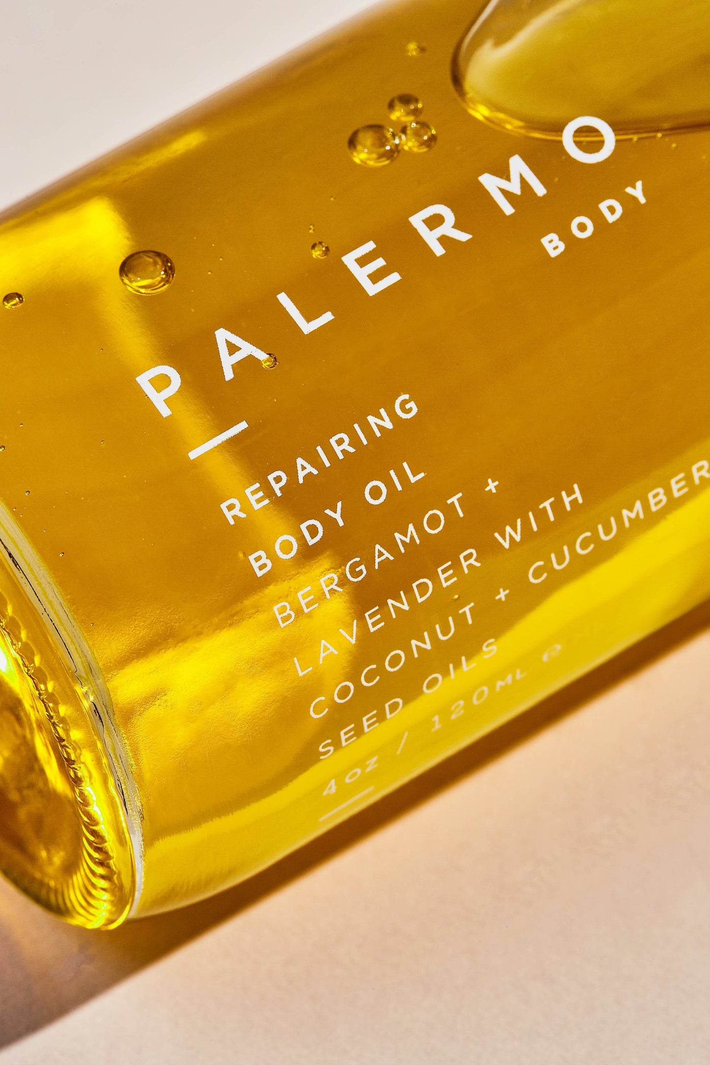 Close-up on a bottle of the repairing body oil Bergamot and Lavender from Palermo