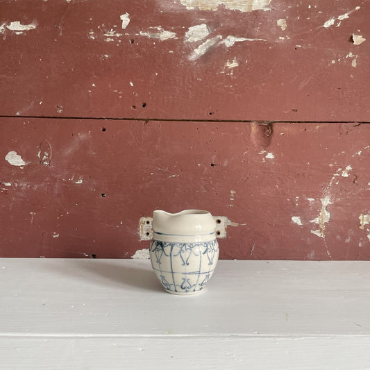 Pottery creamer
