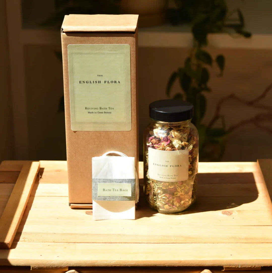 Handmade natural reviving Bath tea gift set with packaging on a wooden surface