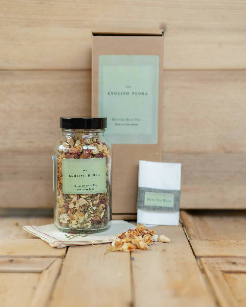 Handmade natural reviving Bath tea gift set with packaging on a wooden surface