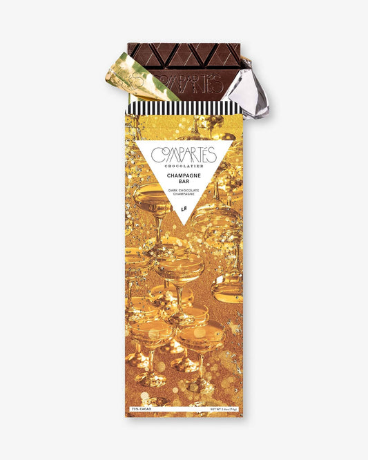 A gourmet dark chocolate bar with a golden wrapper featuring champagne graphics and the text 'Champagne Dark Chocolate Bar'.