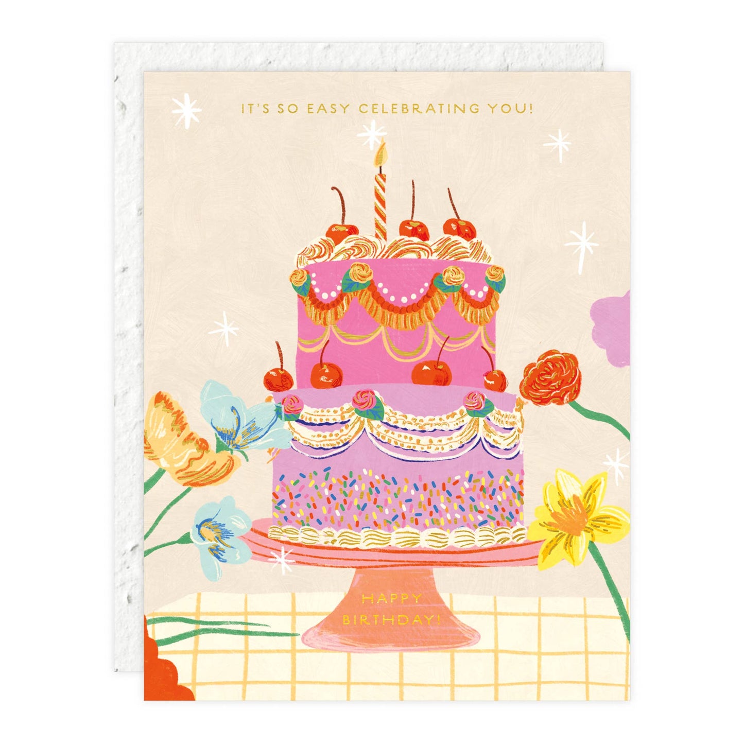 Greeting card with a colorful birthday cake illustration and flowers on a beige background.