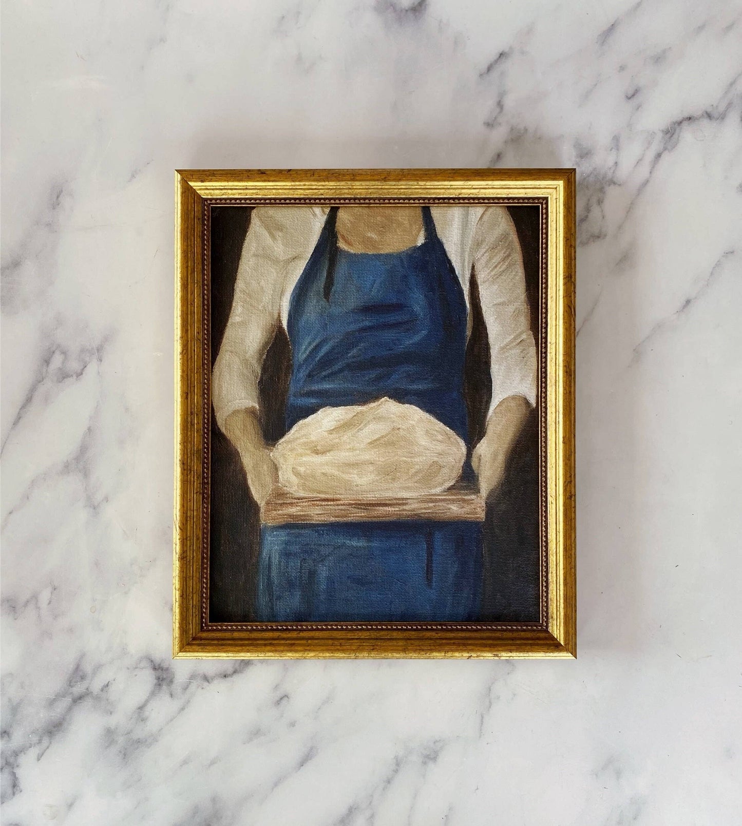 French-inspired art print of a woman holding sourdough bread, reproduced as a premium Giclée print.