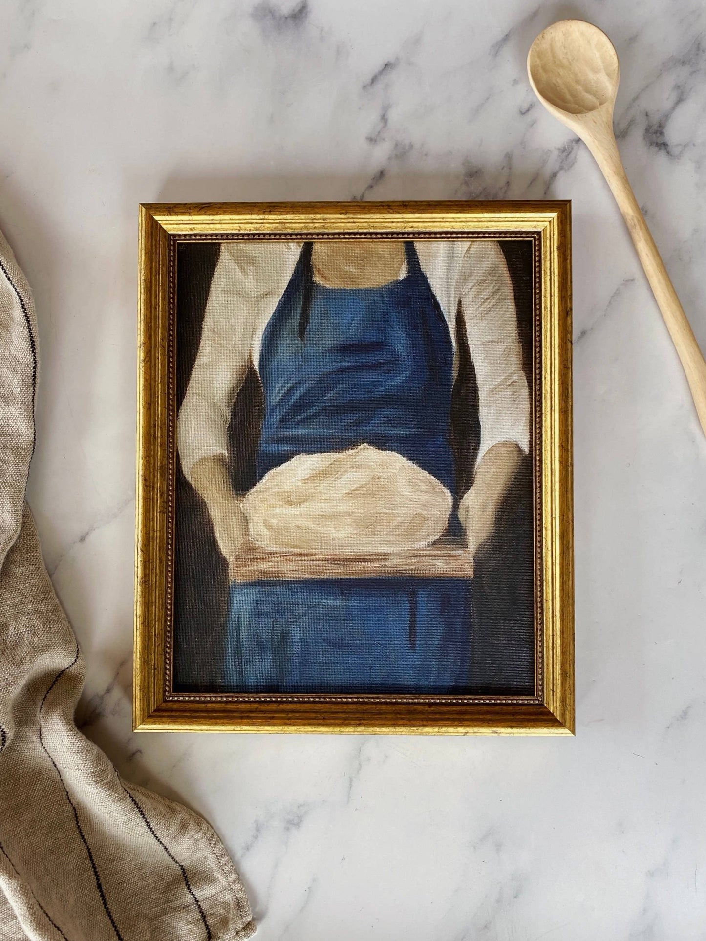 French-inspired art print of a woman holding sourdough bread, reproduced as a premium Giclée print.