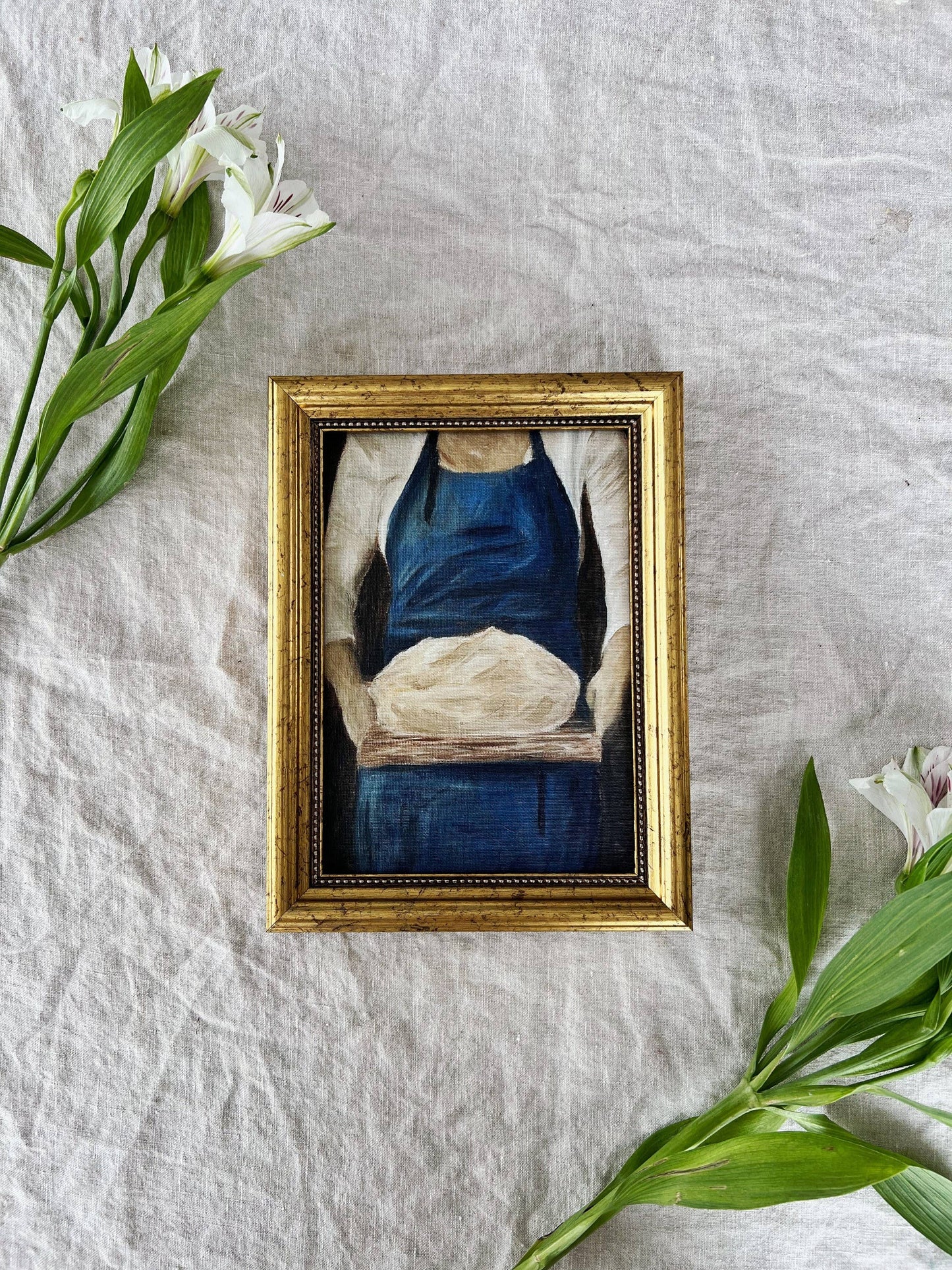 French-inspired art print of a woman holding sourdough bread.