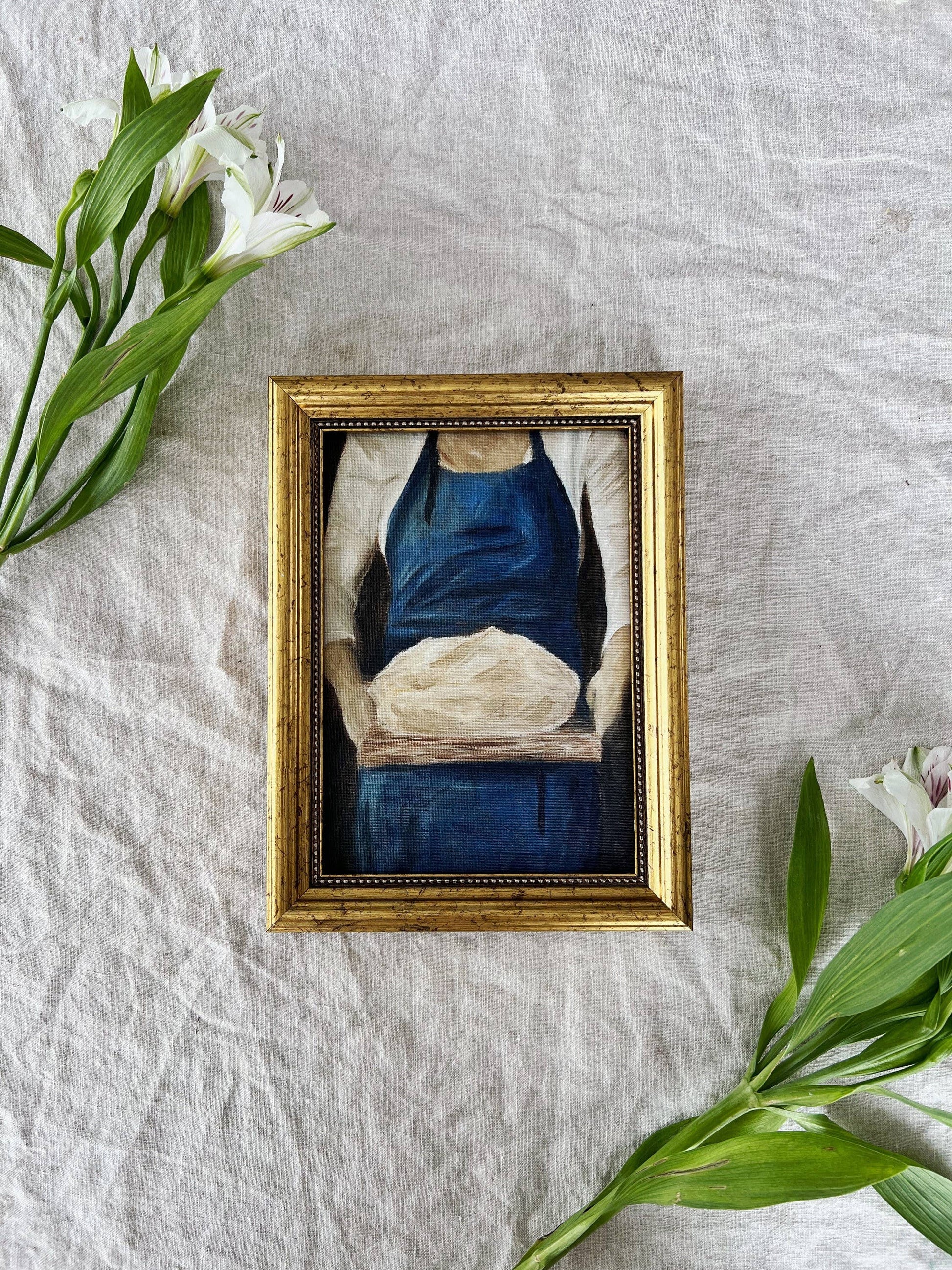 French-inspired art print of a woman holding sourdough bread.