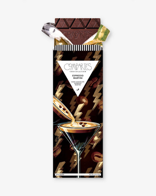 A Compartes dark chocolate bar with a sophisticated design, labeled 'ESPRESSO MARTINI', indicating a combination of chocolate, vodka, and espresso flavors. The packaging is dark with espresso-colored drinks and chocolate pieces, suggesting the product's flavor profile.