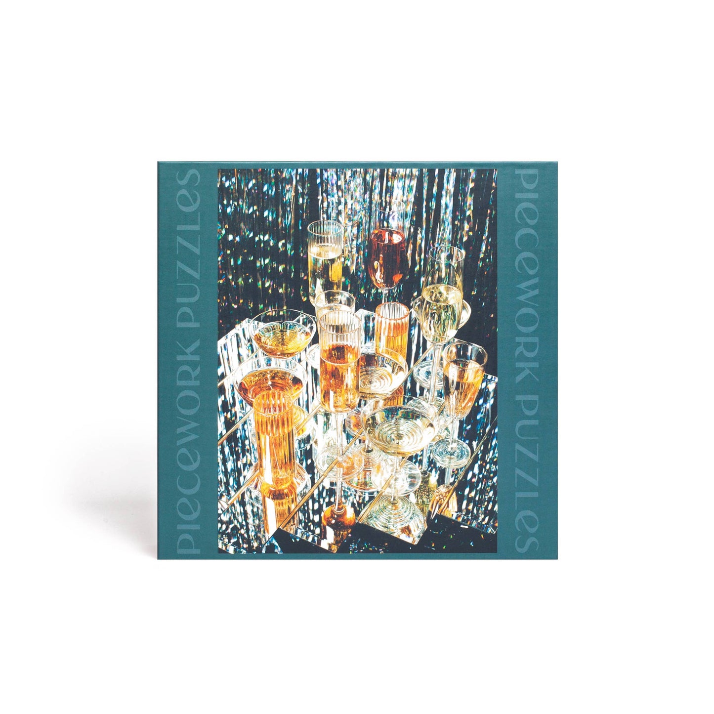 Disco Queen 500-piece puzzle box with colorful artwork depicting glasses and cocktails from Piecework Puzzles