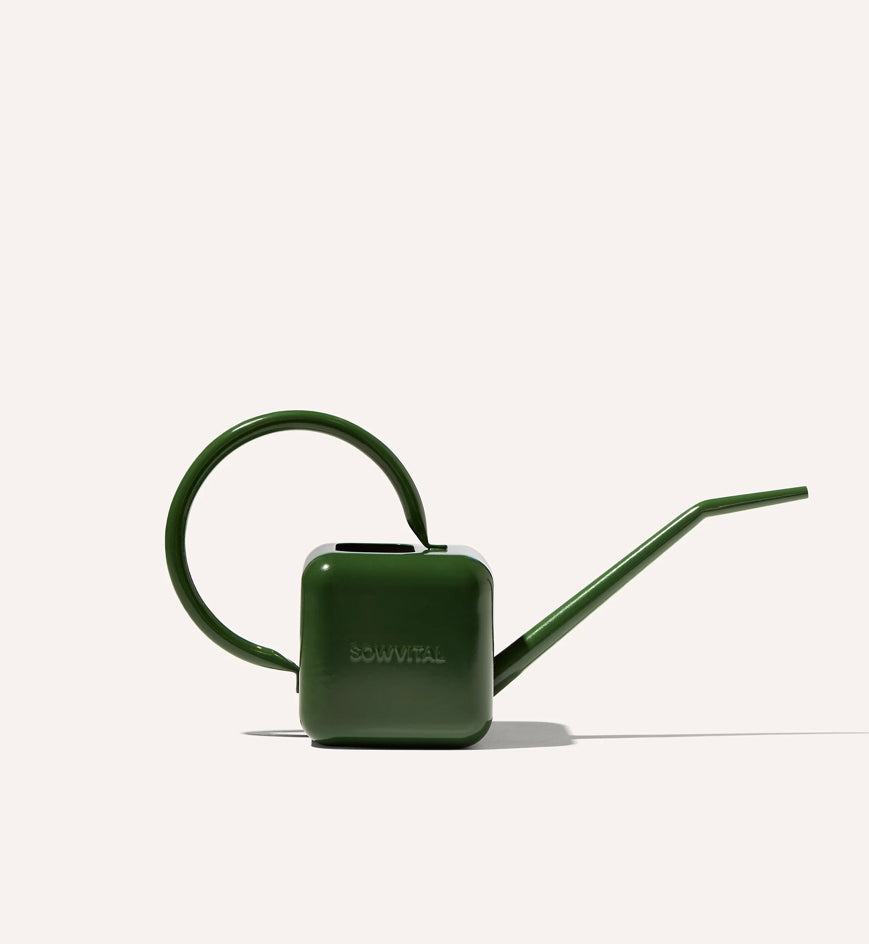 Stylish ergonomic watering can for easy, spill-free watering, on a white background