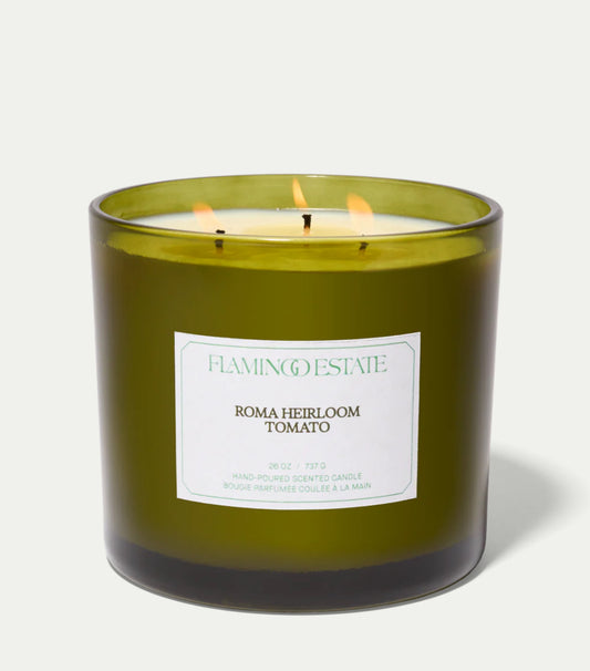 Green Heirloom Tomato XL candle with a Flamingo Estate label on a white background