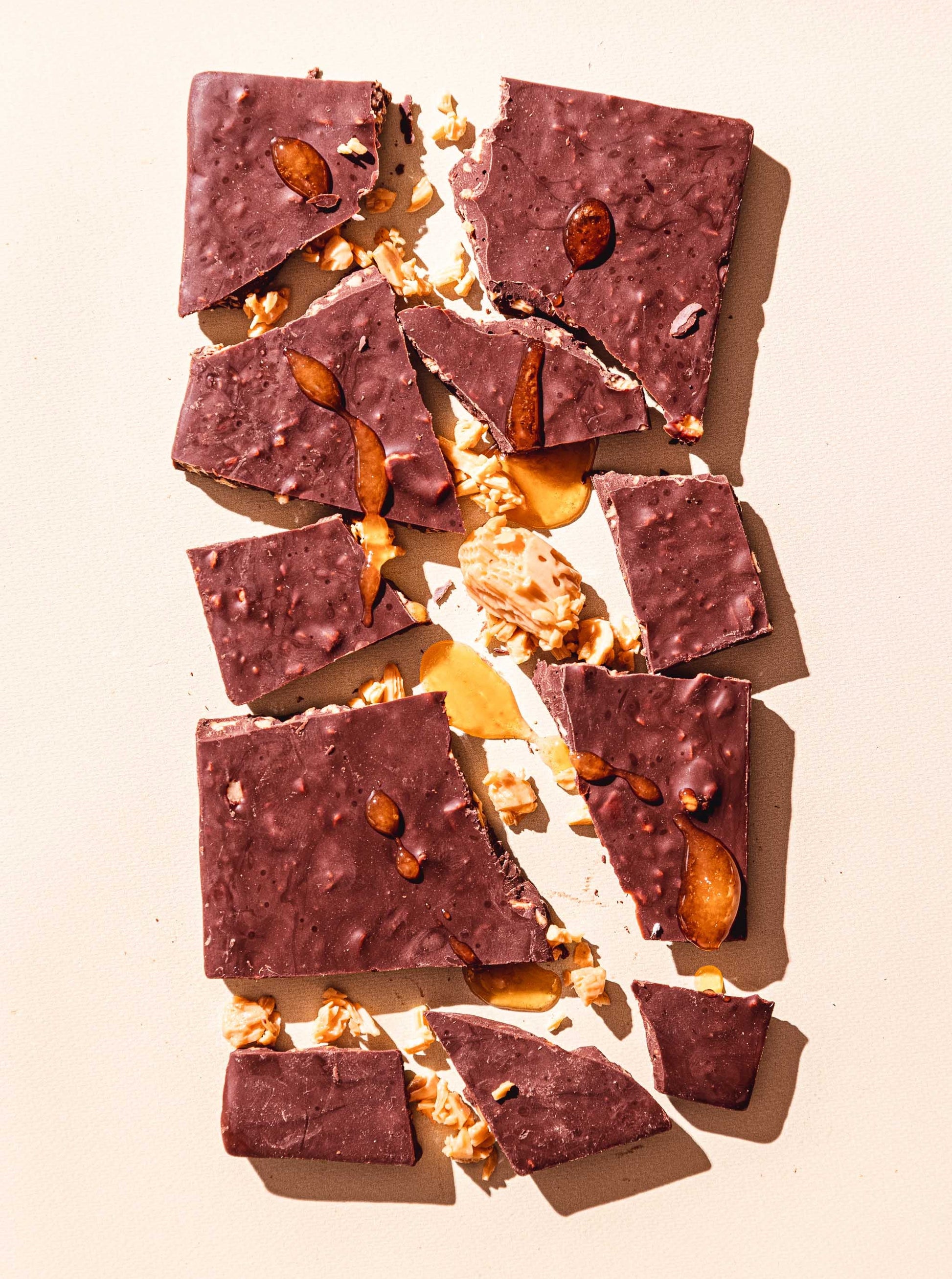 Chunks of the Honeycomb Crisp Groumet Dark Chocolate bar from Compartes chocolate.