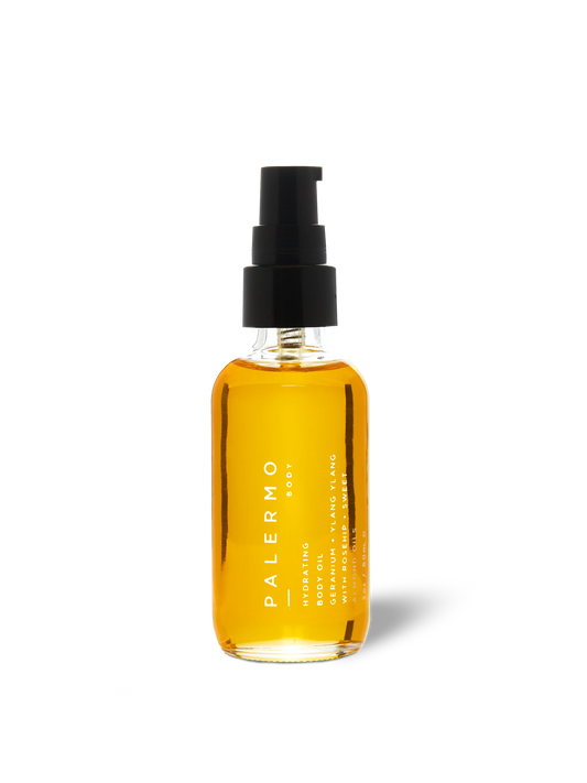 Bottle of Palermo body oil on a white background