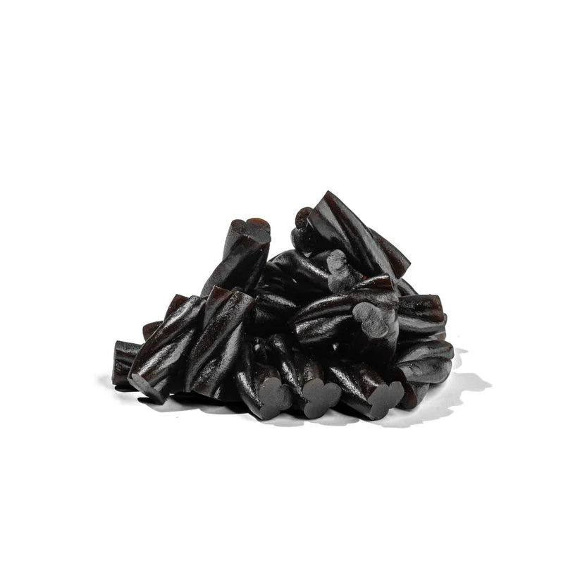 Pile of black licorice twists from the brand Bonbon, a swedish candy co., on a white background
