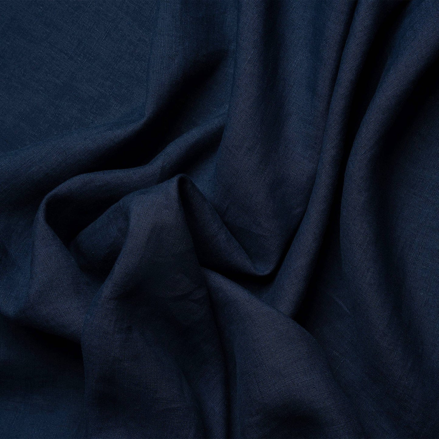 Linen table runner in storm blue color by Menique.