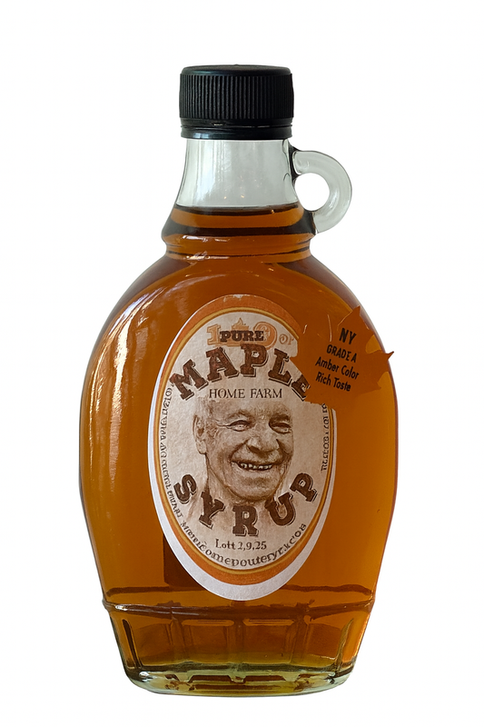 Bottle of maple syrup from upstate New York with a label on a white background.