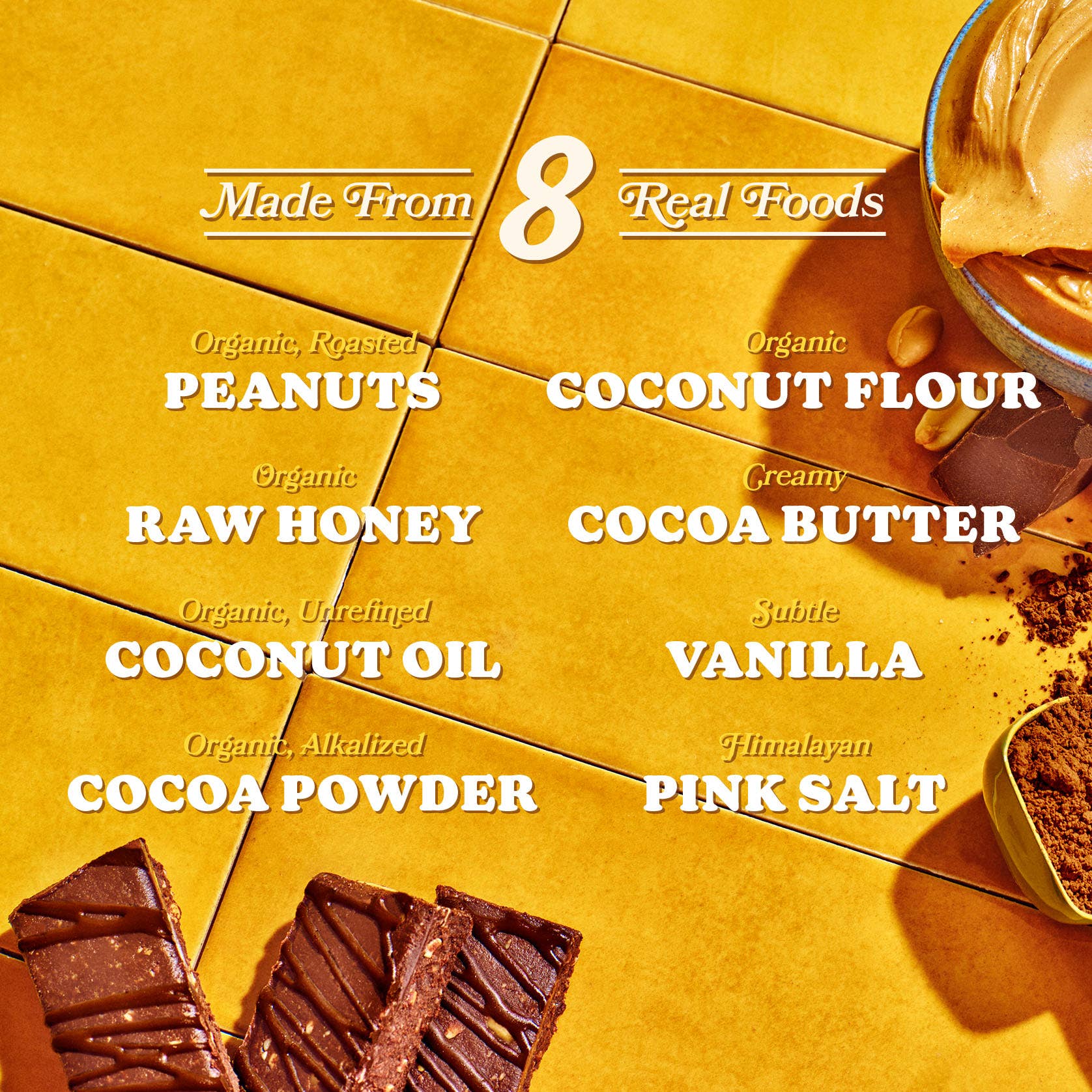 The real foods used to make the Honey Mama’s Peanut Butter Chocolate Bar with roasted peanuts and honey.