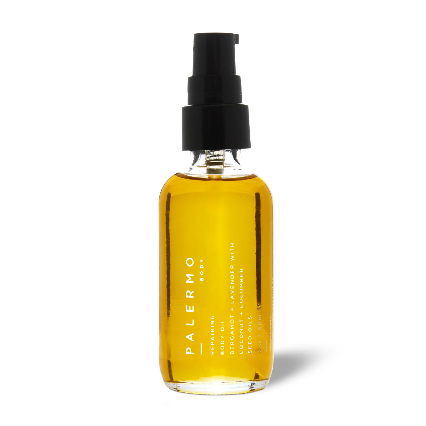 Bottle of Palermo body oil with a black spray cap on a white background