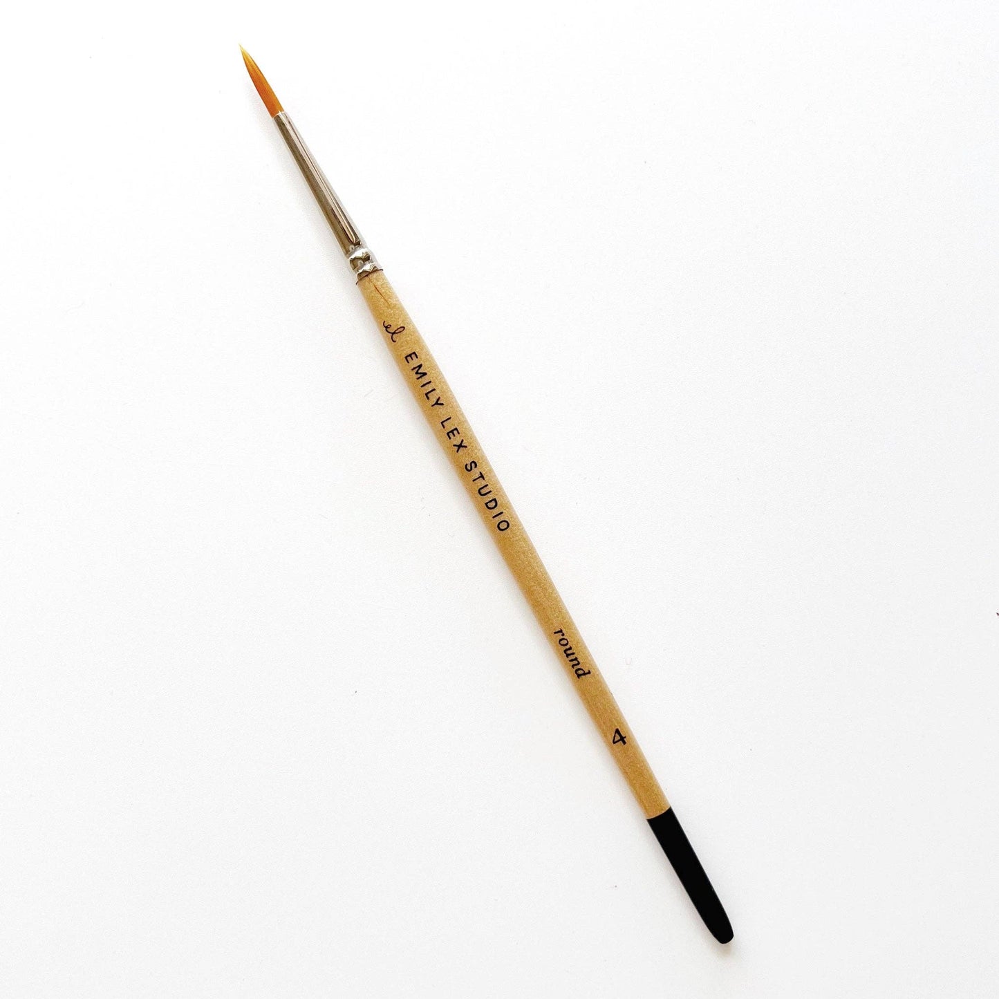 A watercolor paintbrush with golden synthetic taklon bristles, seamless aluminum ferrules, and lacquered wood handles, from emily lex studio, size 4, great for the bulk of the paintings.