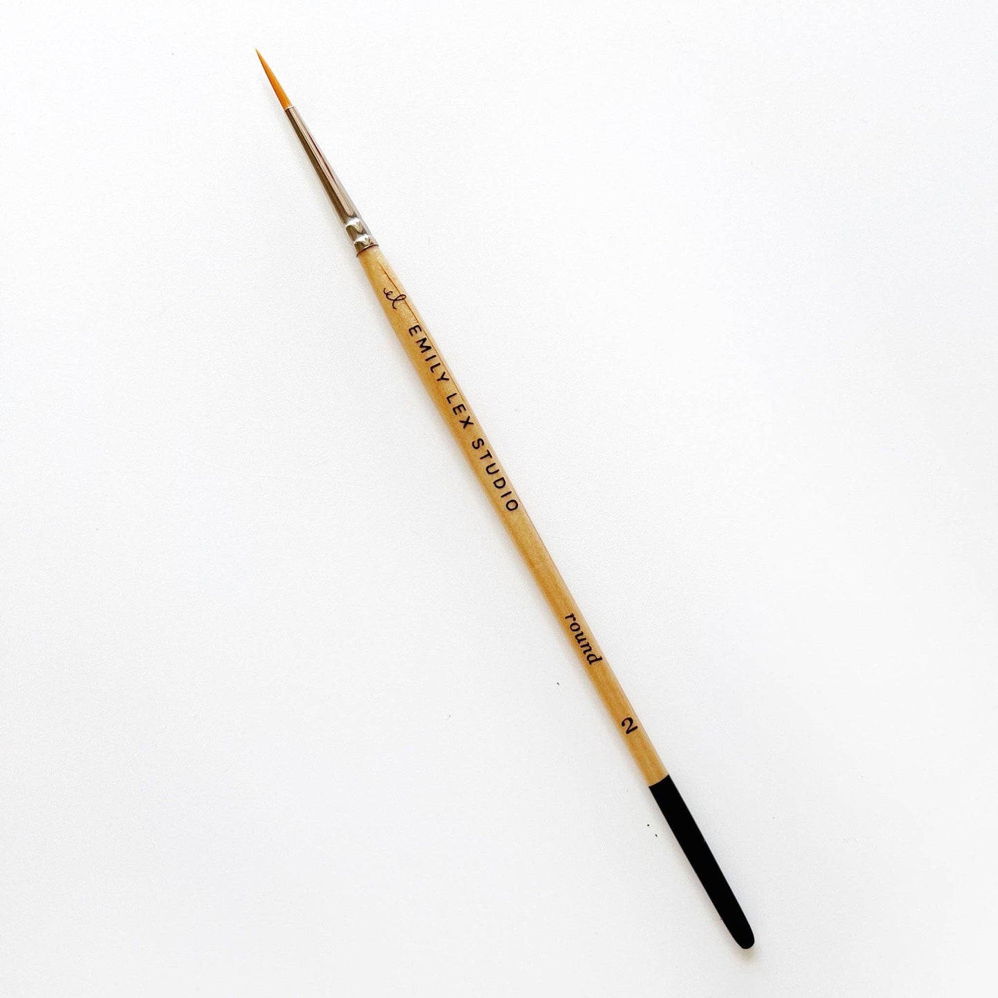 A watercolor paintbrush with golden synthetic taklon bristles, seamless aluminum ferrules, and lacquered wood handles, from emily lex studio, size 2, great for small marks.