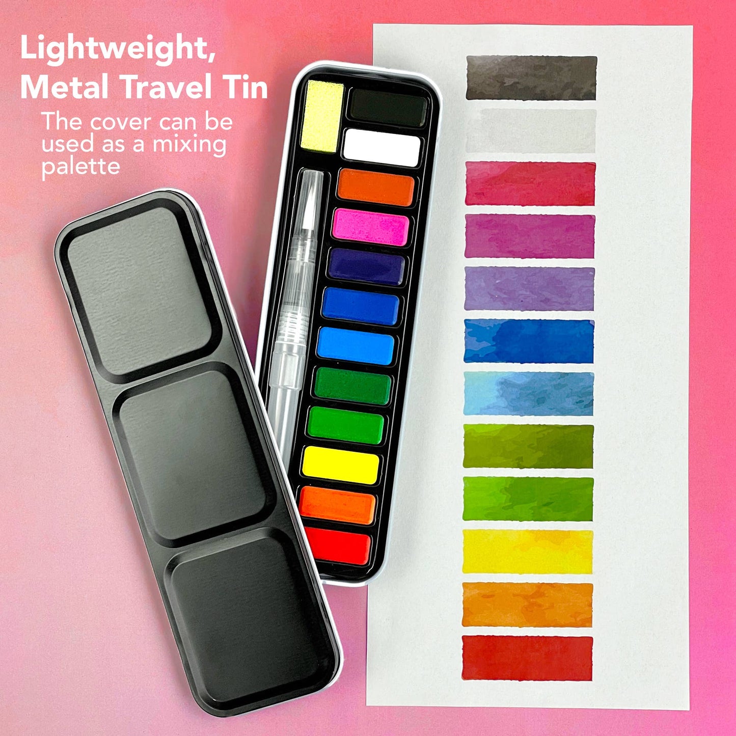 Watercolor paint set with a metal travel tin on a pink background