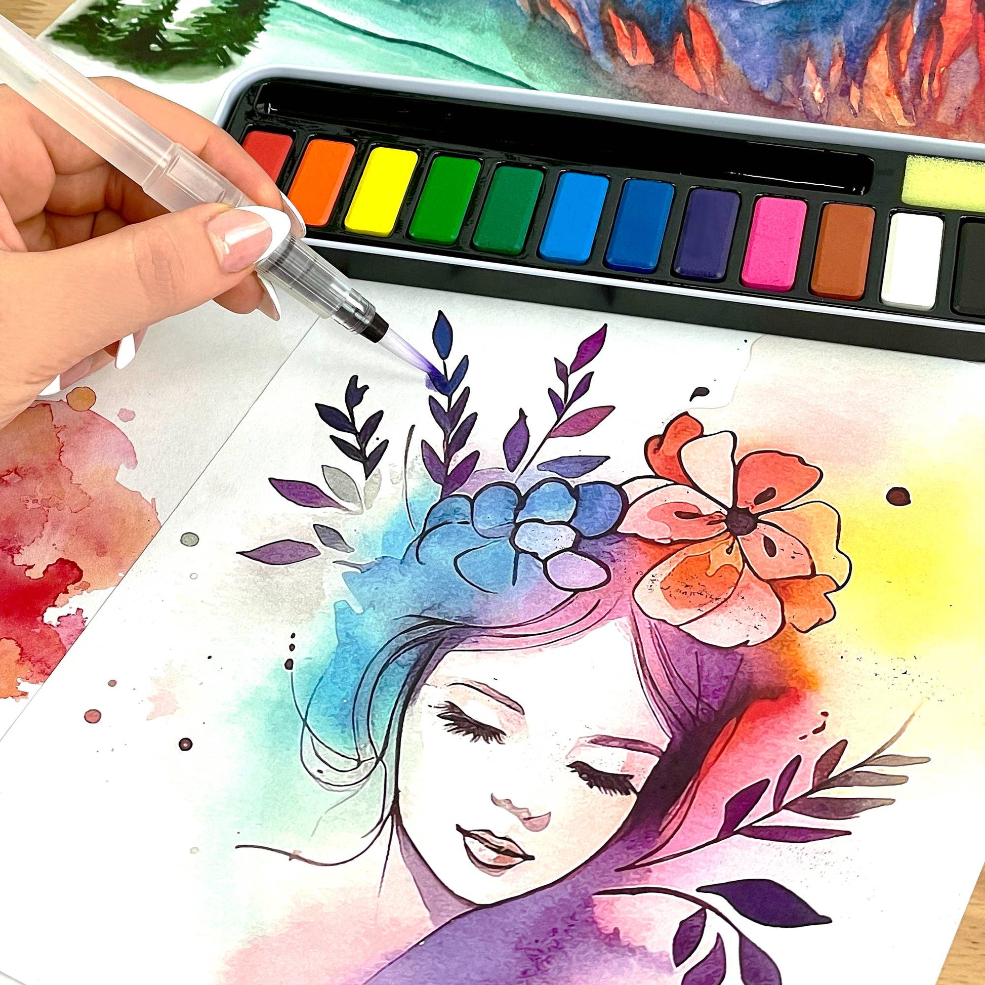 Colorful watercolor painting of a woman's face with flowers and leaves, using a paintbrush and palette.